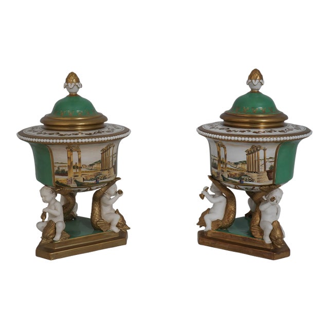 Pair French Style Lidded Urns W. Cherub Bases For Sale
