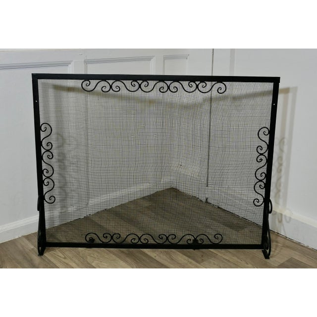 Large Old Wrought Iron Fire Screen This is a very useful piece, with a fine mesh spark guard and decorative iron work In...