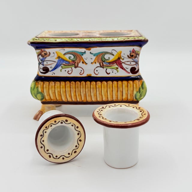 Imagine the letters written with ink for these wells. The hand painted detail in this 1950s CACF majolica ink well is...