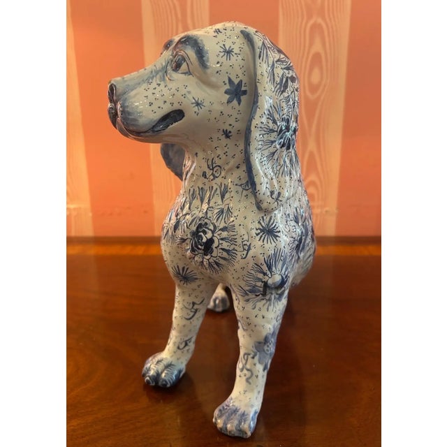 Fantastic rare and whimsical French faience dog with such a beautiful face and decoration. Marked "france" this piece...