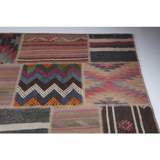 Mid 20th Century Bohemian Turkish Kilim Patchwork Rug With Tribal Motifs -5' 7'' X 9' 10'' For Sale - Image 9 of 12