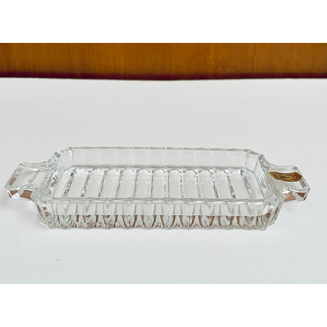 A simply elegant clear crystal dish to complement a variety of situations and styles.