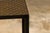 A small side table with Louis Vuitton leather top mounted on a custom metal base with cross stretchers. Immerse yourself...