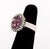 Purple Gemstone, Diamond, and 10K White Gold Ring, featuring one prong set oval purple faceted gemstone approx. 12 x 10...