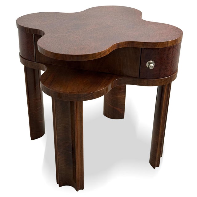 An exceptional Art Deco coffee table dating from the 1930s, distinguished by its elegant quatrefoil-shaped top and...