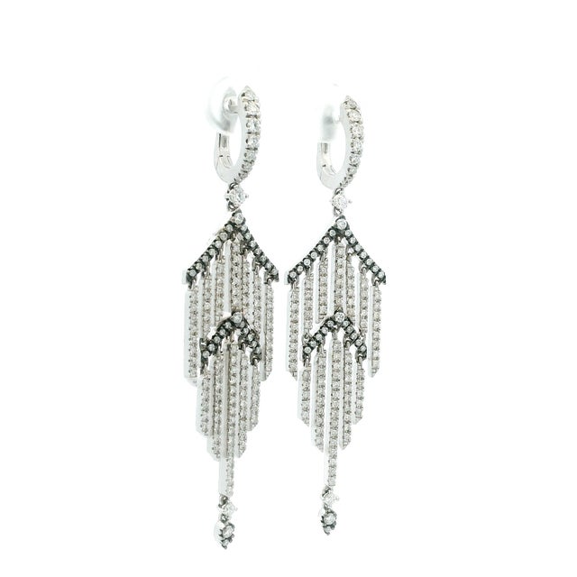 Spectacular chandelier earrings by Italian jewelry house Casato, crafted in 18-karat white gold and set throughout with...