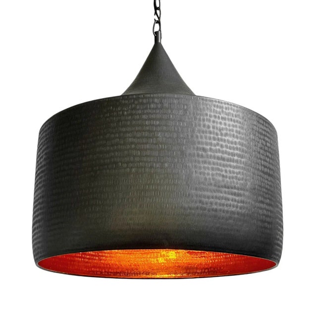 Hand hammered solid copper round hat shape pendant light with rich dark bronze exterior finish and true bright copper...