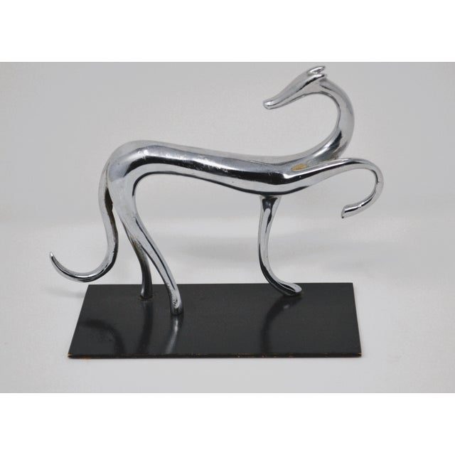 Laszlo Hoenig Attribute Art Deco Greyhound Sculpture Austria. Beautiful stylized White Brass Chrome plated sculpture on...