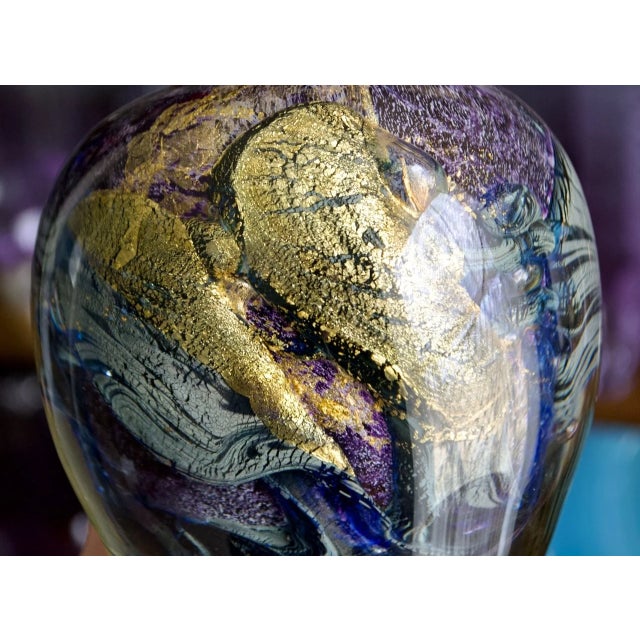Striking blown art glass bottle by renowned French glass artist Jean-Claude Novaro, dated 2005. This sculptural piece...