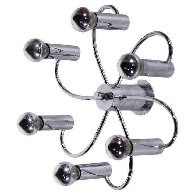 This stunning pair of vintage Mid-Century Modern "Sputnik" flush-mount lamps or wall lamps set of two pieces was crafted...