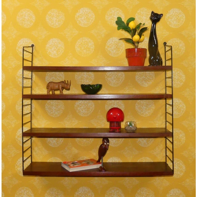 An absolute classic! Simple Swedish design Design classic Nisse Strinning designed his famous shelving system in 1949. It...