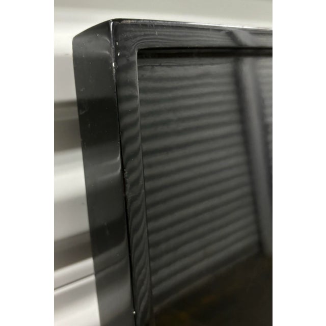 A large Kelly Hoppen Lacquer tray in black lacquer with a felt backing. Perfect for styling a coffee table