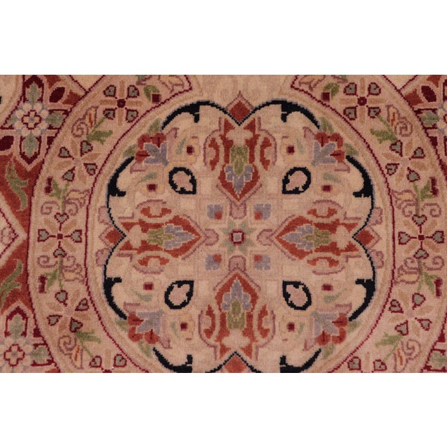 Designed with mesmerizing intricacy and gorgeous color palette, this hand-knotted masterpiece demonstrates the beauty and...