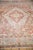 :: Concentric stepped center medallions in diamonds shaped contour atop a covered field of a continuously scrolling vine...