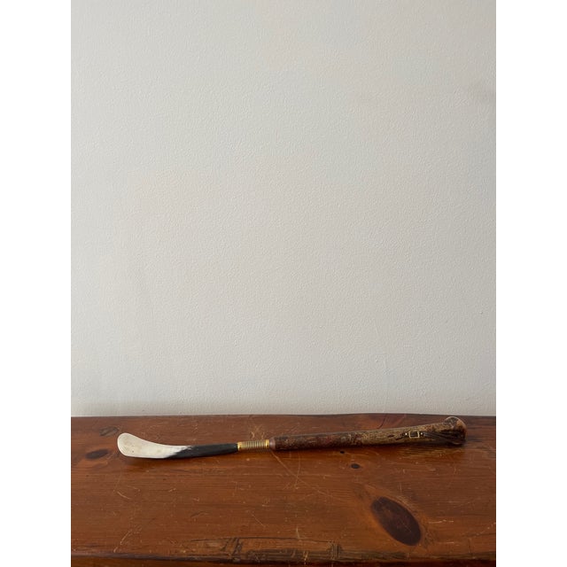 1940s shoehorn made from antler and brass. Lovely leather strap detail. Great gift for Pa, or for display on a hook in a...