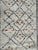 Nice mid century tribal Beni Ouarain Moroccan rug with a geometrical design and with field, orange, beige, brown and black...