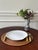 White ceramic dinnerware pieces are timeless and classic. This set of four shell shaped plates are by Apilco, the historic...
