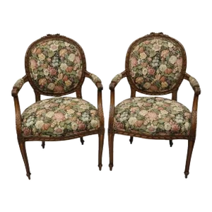Early 20th Century Vintage French Country Louis XV Style Carved Round Back Walnut Arm Chairs - Pair
