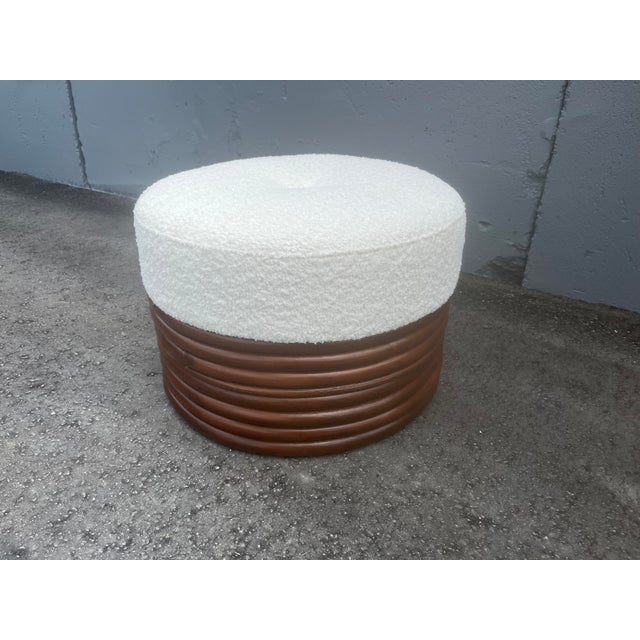 Round Rattan Ottoman, white boucle fabric seat. Ready for a new home. The ottoman is not signed.