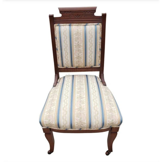 Antique Eastlake Parlor Chair from the Victorian Era approximately the late 1880's - 1890's with original wood front...