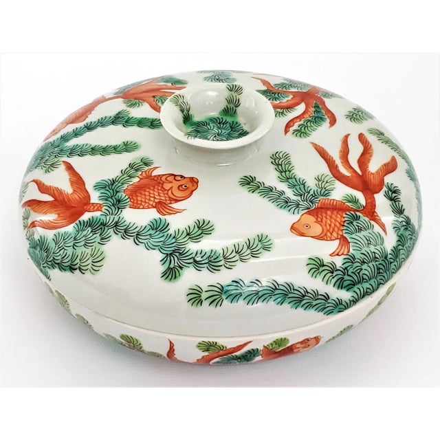 Offering a rare vintage Chinese porcelain divided lidded serving dish, circa Mid 20th Century. This is a hand painted dish...