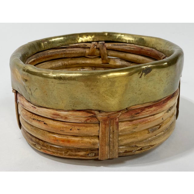 Vintage Gabriella Crespi style split rattan wine coaster with thick brass rim. Alternative use as a chic trinket dish or...