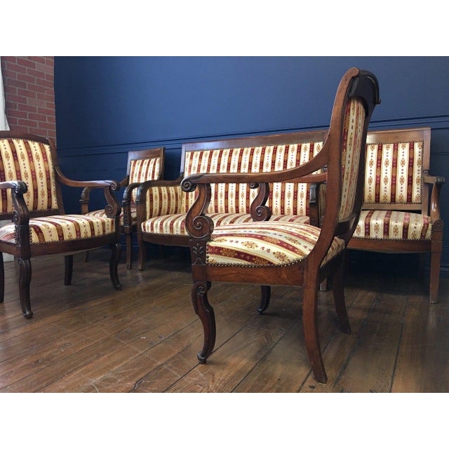 Set of four fauteuils and one large sofa. Mahogany wood. Beautifully restored. Very comfortable and elegant. French work...