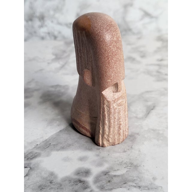This is a late 20th century Shaman head figurine. It is hand carved from Kenya. The word shaman means "one who sees" or...