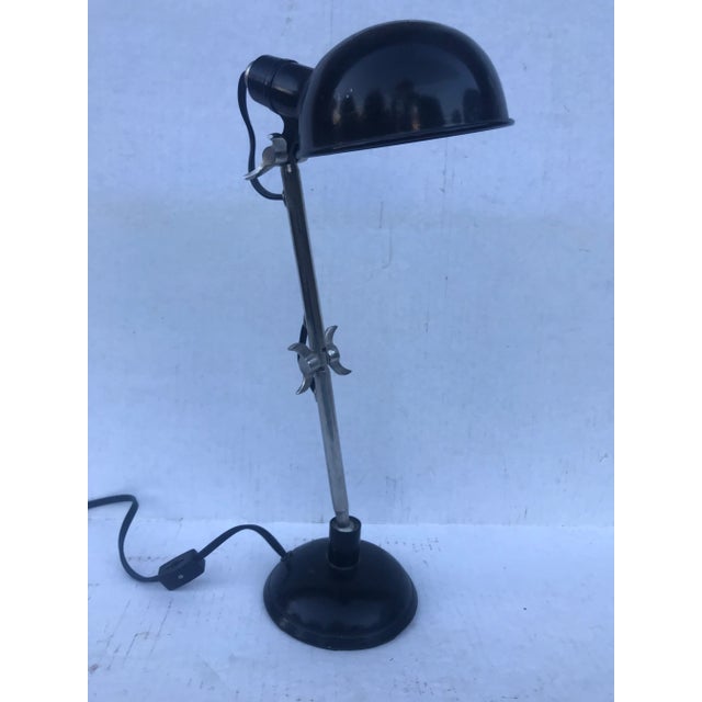 This is a beautiful lamp reminiscent of the 1950's but is much newer (probably late mid century) vintage). It has multiple...