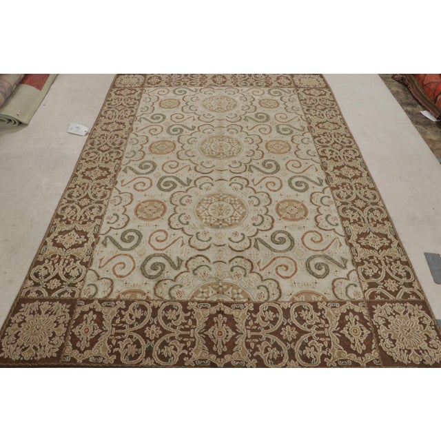 Made with a particular blend of heavy, durable wool and sheen silk unique to this custom rug collection, this contemporary...