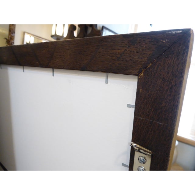 This beechwood mirror has a weathered finish, measures 55.75"H x 30.75"W and hangs vertically, though you can hang it...