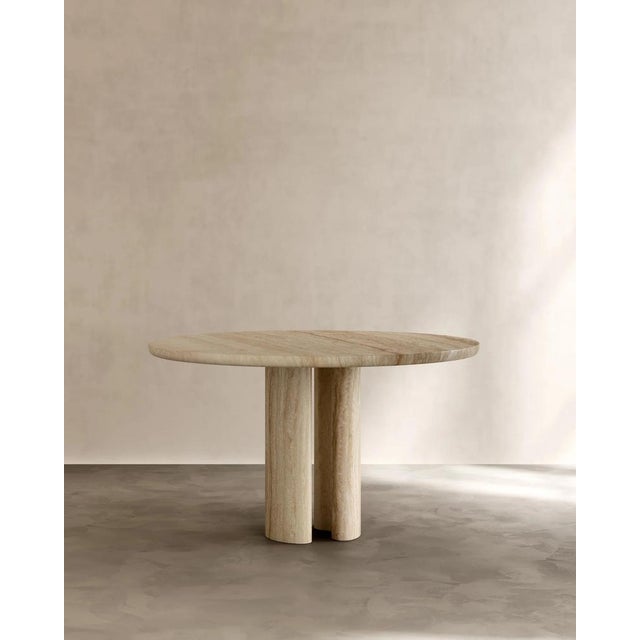 Roman dining table ii in classico alabastrino travertine by paloma editions dimensions: d 130 x w 130 x h 75 cm....