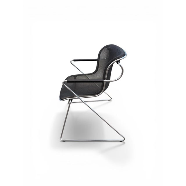 Acquire the Penelope chair by Charles Pollock (Castelli, 1982). A modernist masterpiece in chromed steel and mesh. A...