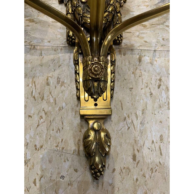 1900’s Caldwell neoclassical style gilt bronze sconces with 3 lights