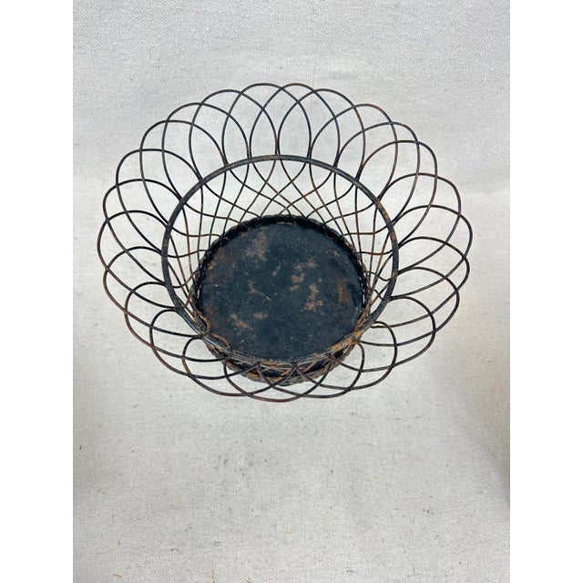 Vintage French black wire metal cachepot with flared design and twisted metal detailing. This is a pre-owned item so...