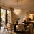 Aloadecor 24'' Wide Vintage Mid-Century Modern Chandelier 4-Light 4-Tier Clear Art Glass Pendant With Antique Bronze Finish For Sale In Houston - Image 6 of 7
