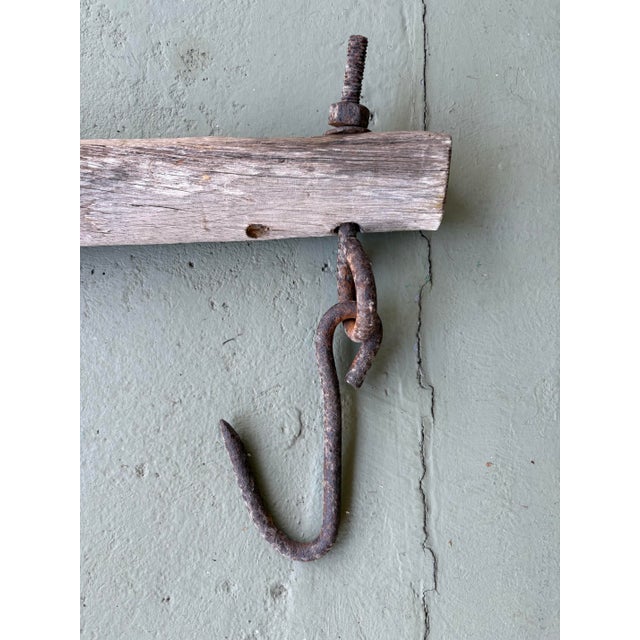 Early 20th Century Antique Rustic Wooden Beam Rack With Hand-Forged Iron Hooks For Sale - Image 5 of 7