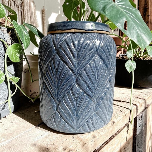 This exquisite Blue Ceramic Scalloped Lidded Jar combines elegance and functionality, making it a perfect addition to any...