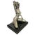 1970s style erotic bronze re-cast of a kneeling nude young girl with one hand resting against her wind-blown hair, one...