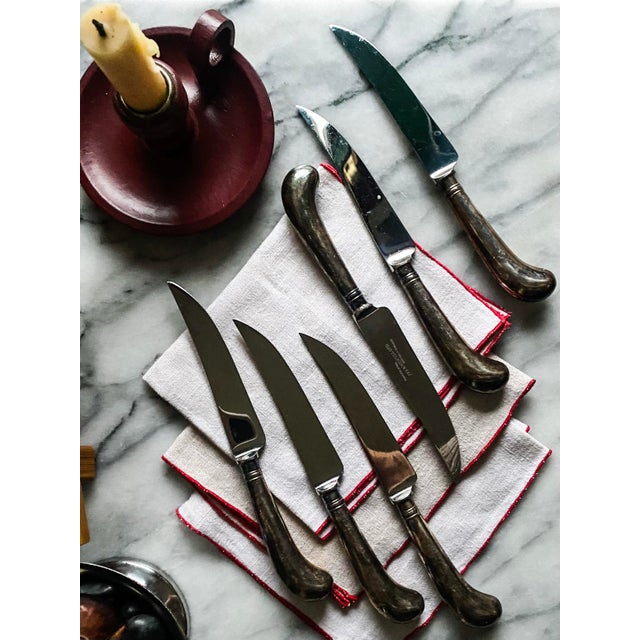 A set of six vintage knives with steel blades and silver-plated pistol handles. Made by Fry and Wigfull, Sheffield,...