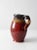 This hand-crafted vintage studio pottery pitcher embodies wabi sabi decor. The rustically crafted ewer has an off-center...