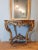 Antique carved and gilded wood console table with red marble top (Incarnat Turquin marble), Rococo, 19th century....