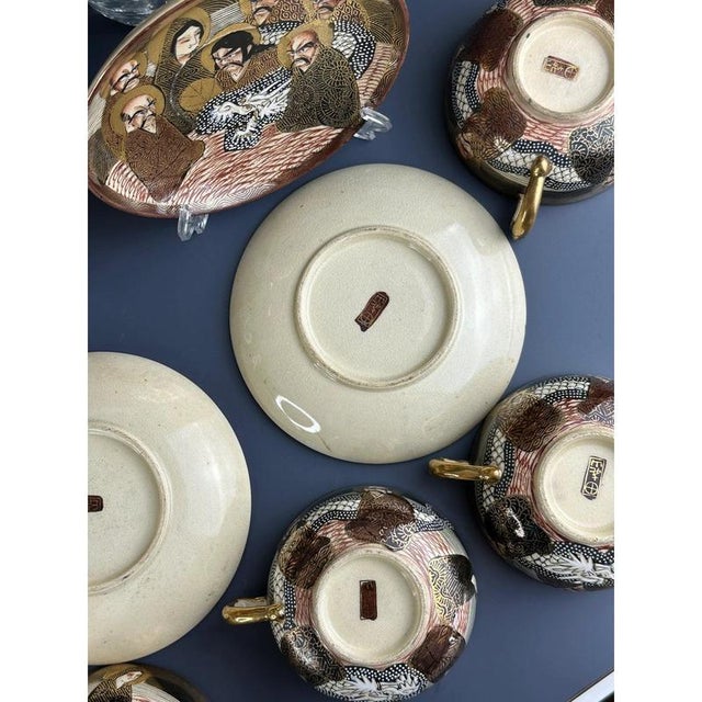 Antique Japanese Meiji Hand-Painted Shimazu Satsuma Tea Service with Moriage Kannon Immortals and Dragons, Set of 14 For Sale - Image 10 of 11