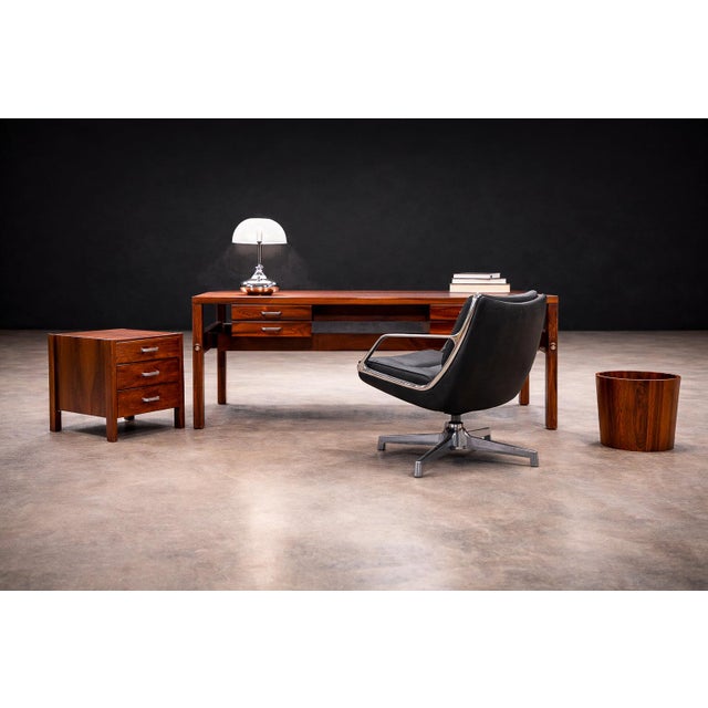 Designed by Jorge Zalszupin, this three-drawer filing cabinet reflects the designer’s disciplined approach to proportion,...