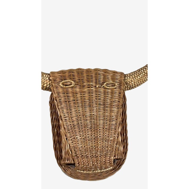 1950's woven wicker bull's head wall sculpture from the Camargue, France. The sculpture was hand crafted. It was woven in...