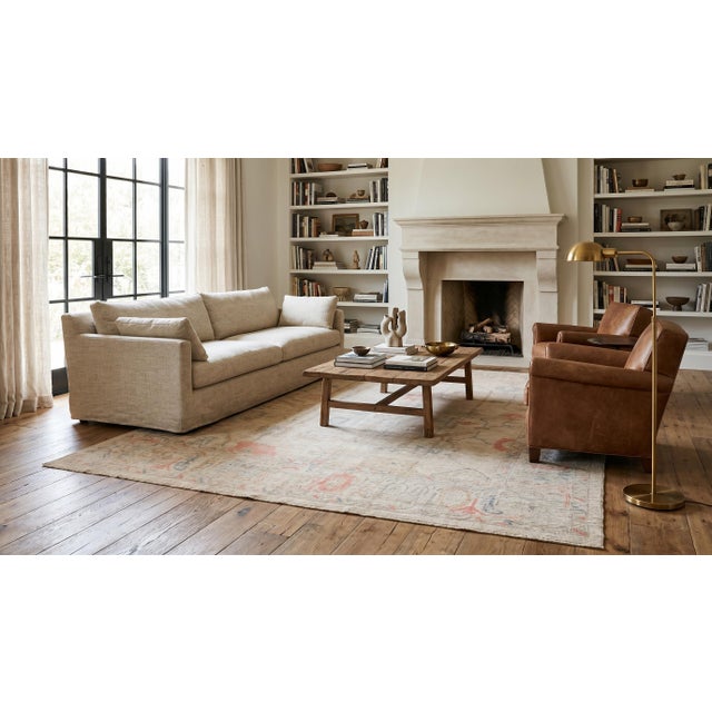 Transform your space with the Modern Oushak Style Wool Rug. Hand-knotted from high-quality wool, it features a low-...