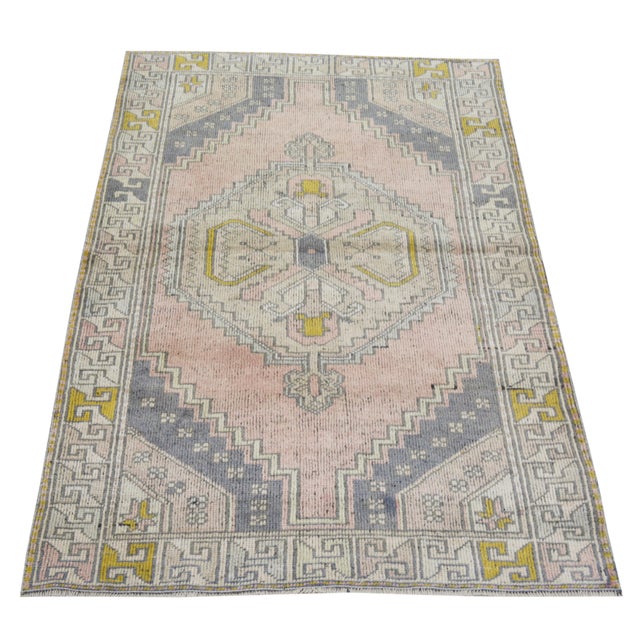 Hand-knotted with care using traditional rug making techniques, this wool rug blends timeless craftsmanship with a modern...