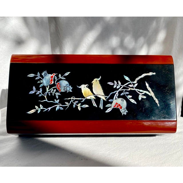 Elegant and quietly sophisticated, this vintage Japanese lacquer smoking box embodies the restrained beauty of mid-century...