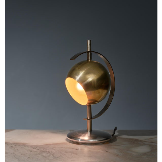 Introducing an alluring pair of Italian table lamps from the 1970s, designed with a striking combination of steel and...