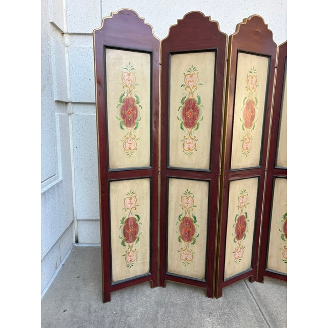 Italian Neoclassical style hand painted wood four panel screen or room divider. The four sections decorated with two...